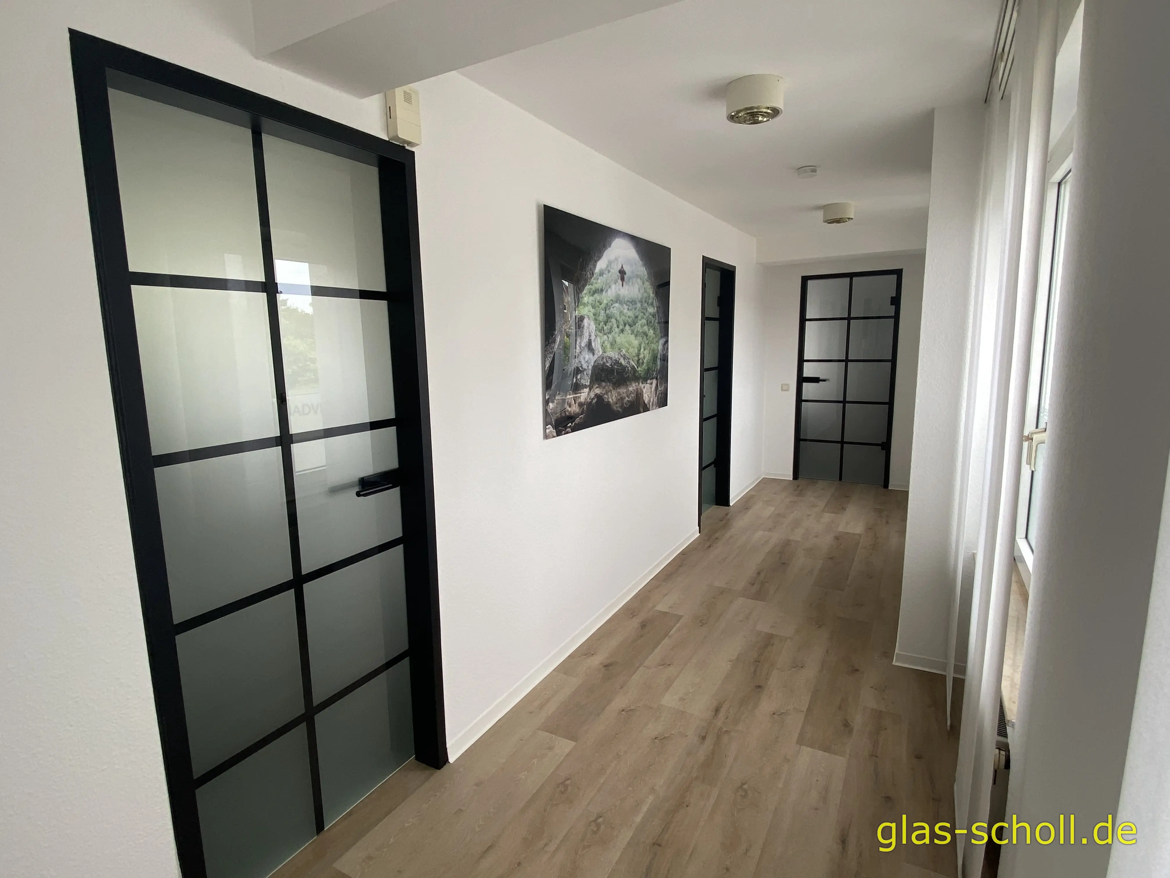 Umbau von Holz auf Industrial-Style Ganzglastüren von www.Glas-Scholl.de