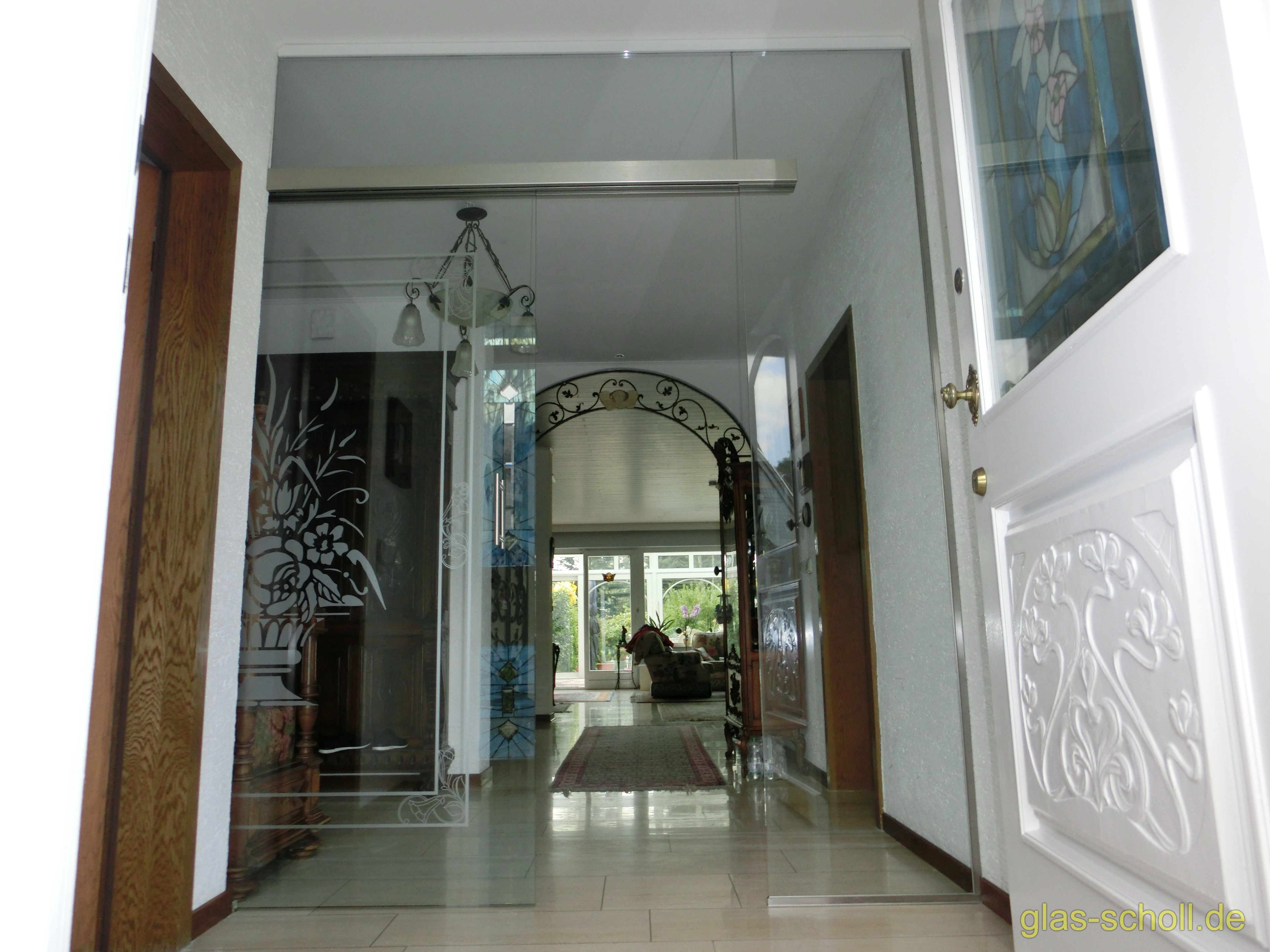 Ganzglas-Schiebetüranlage mit Schiebesystem im Glas von www.glas-scholl.de Portavant im Glas