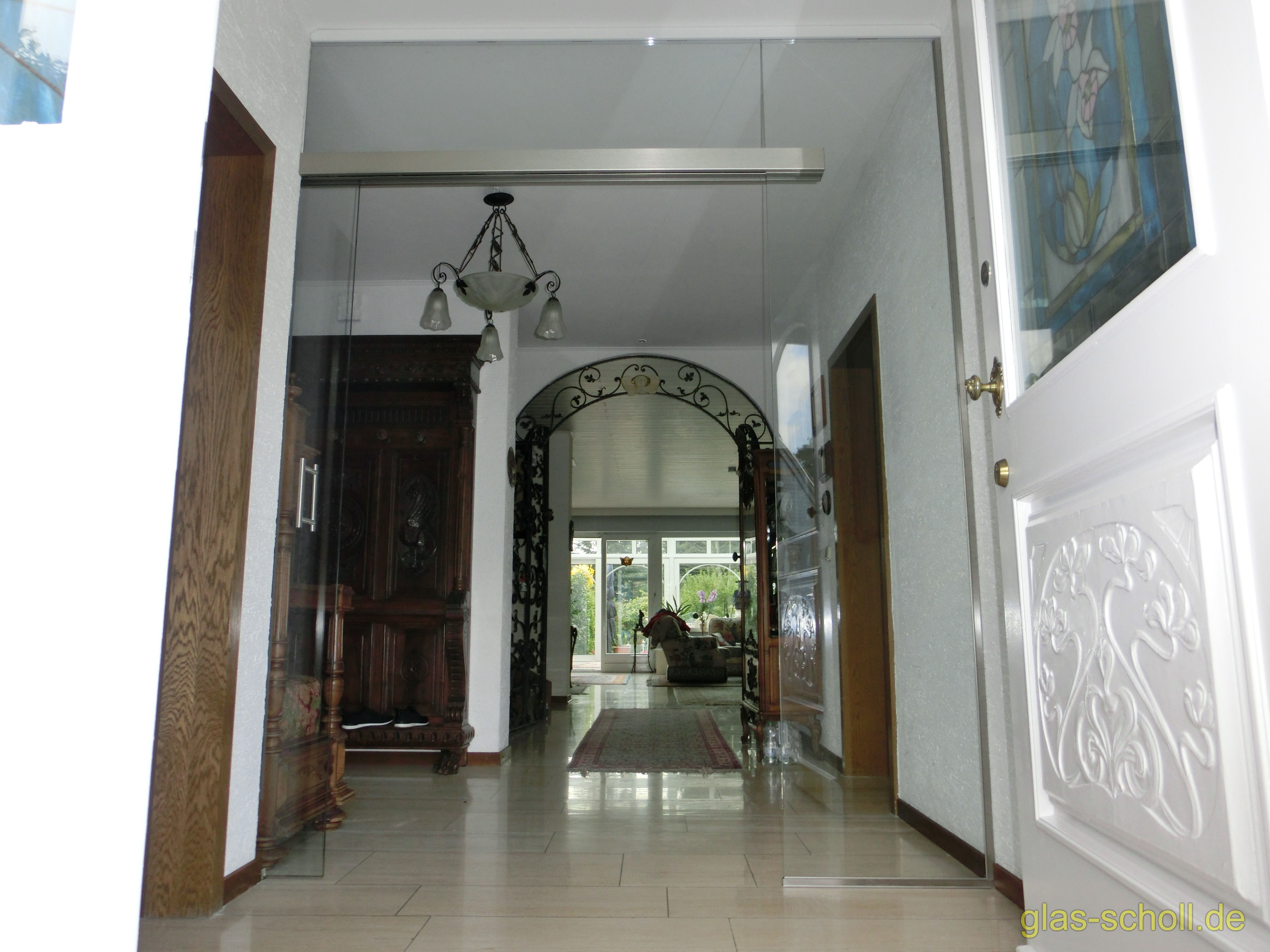 Ganzglas-Schiebetüranlage mit Schiebesystem im Glas von www.glas-scholl.de Portavant im Glas